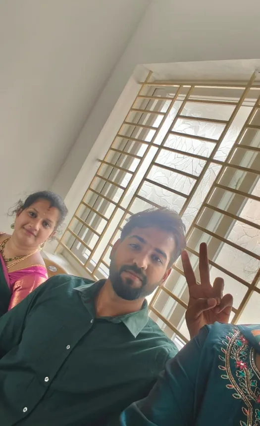 A candid moment together, Rajavel making a peace sign
